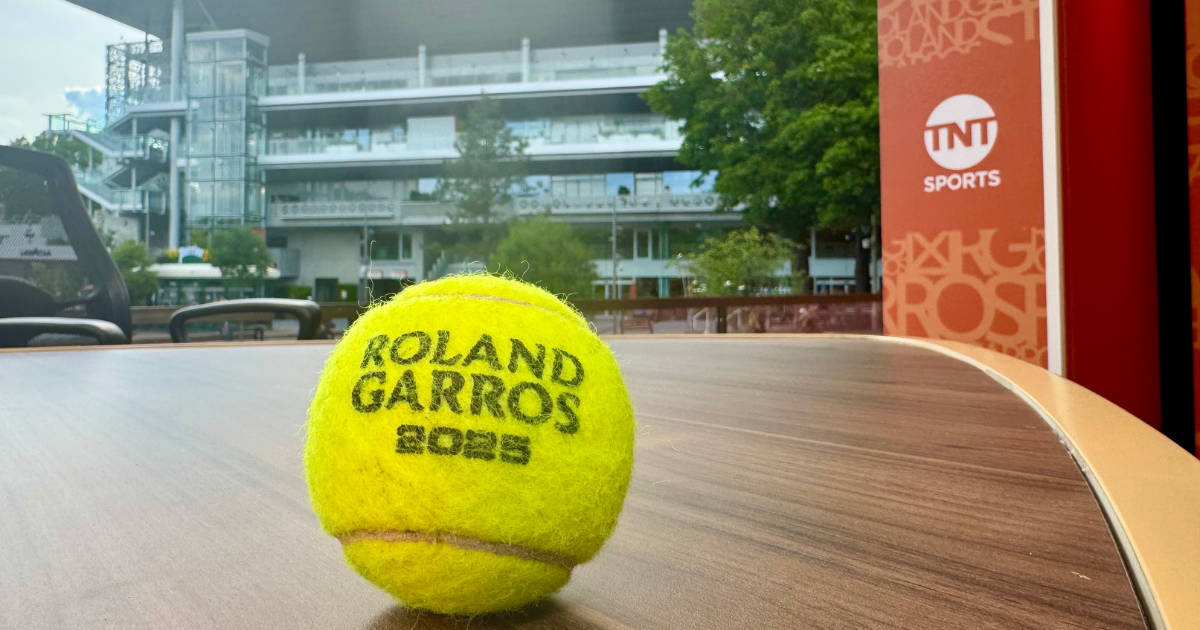 A Roland Garros 2025 tennis ball and TNT Sports logo outside Roland-Garros in Paris